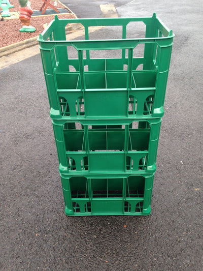 Stacked Green Milk Crates to Hold 8 x 2ltr Milk Bottles or Cartons