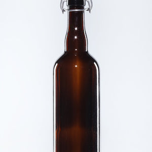 Botella de cerveza de vidrio ámbar de 750ml con tapón cerámico